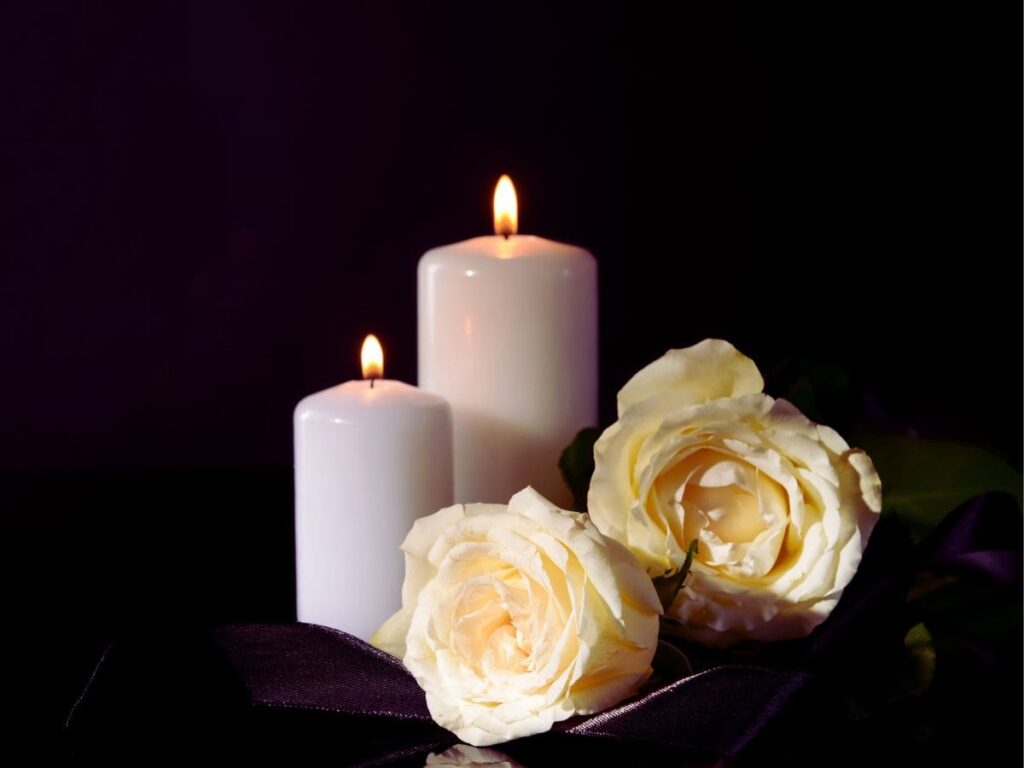 fiori candele lutto