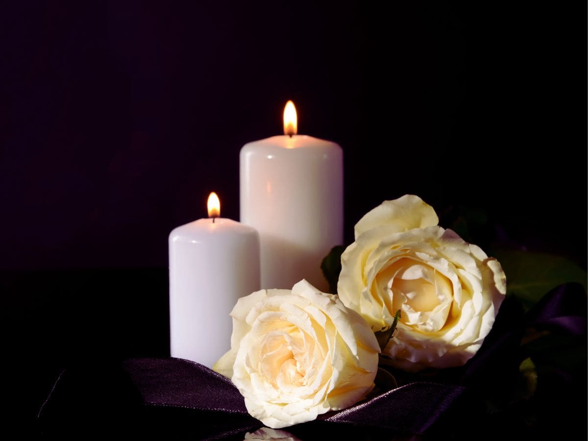 fiori candele lutto
