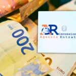 sfondo banconote euro e logo ADE