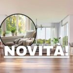 sfondo soggiorno e tondo con finestre senza tende e scritta novità