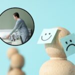 sfondo sagome omini con faccine tristi e tondo con donna che ordina casa