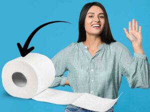 sfondo ragazza dice addio alla carta igienica indicata con freccia