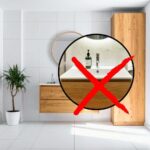 sfondo bagno e tondo con lavabo e X rossa
