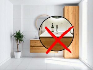 sfondo bagno e tondo con lavabo e X rossa